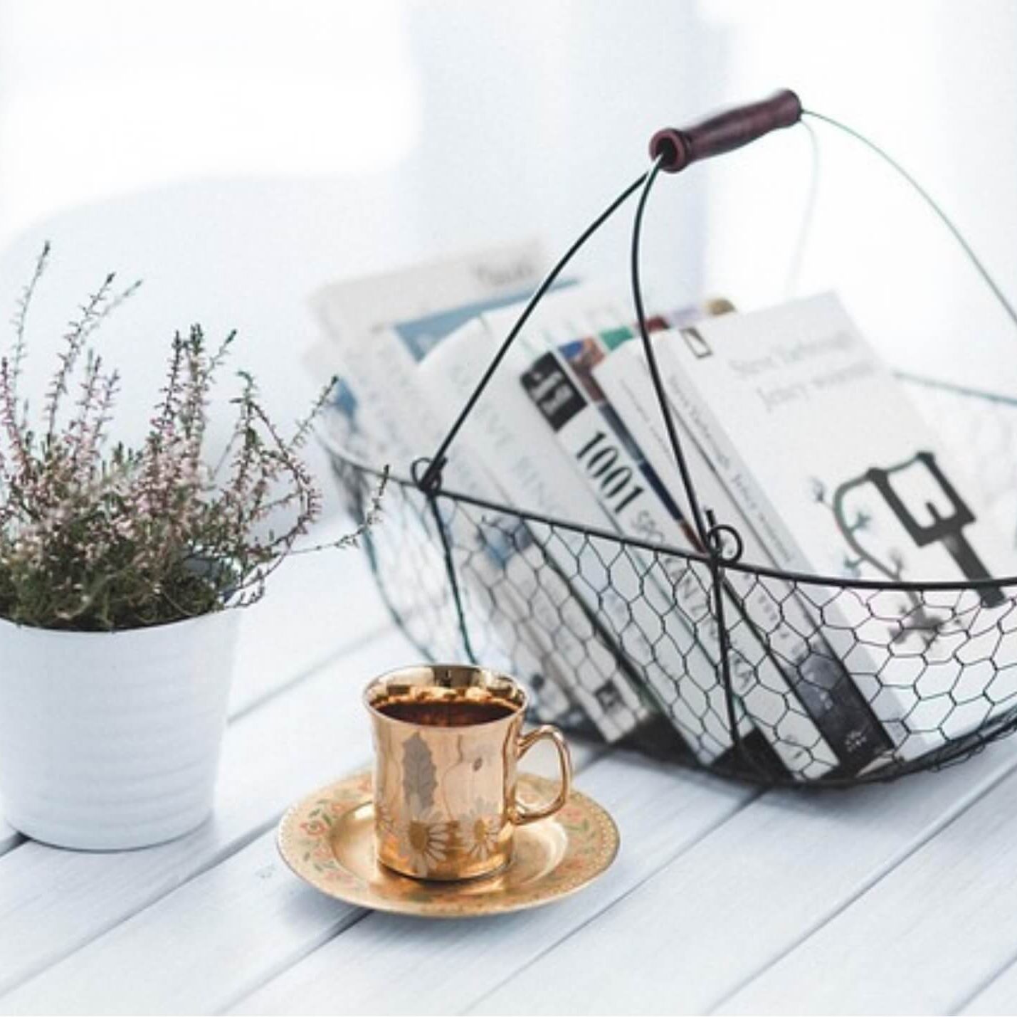 Image of basket of books and coffee for the "Keeping it Simple: Managing the Stress of Stuff" blog post