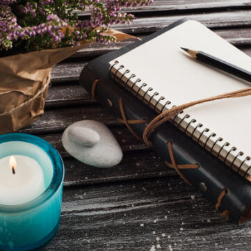 Candle and Notebook