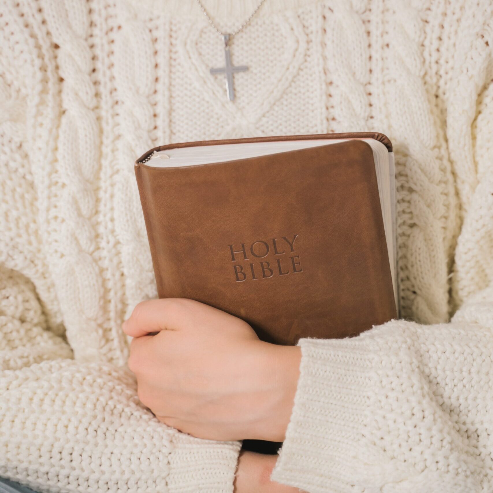 Woman holding the bible